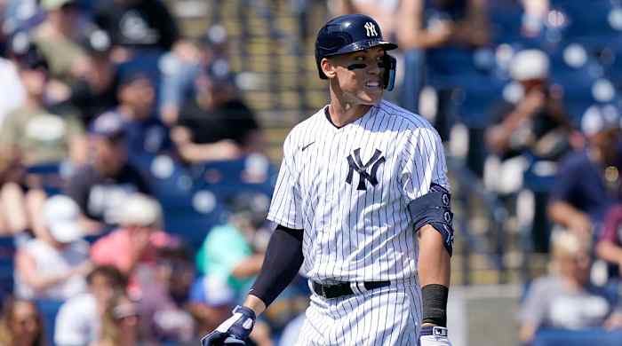 New York Yankees’ Aaron Judge walks to the dugout after striking out swinging during the first inning of a spring training baseball game against the Detroit Tigers, Sunday, March 20, 2022, in Tampa, Fla.